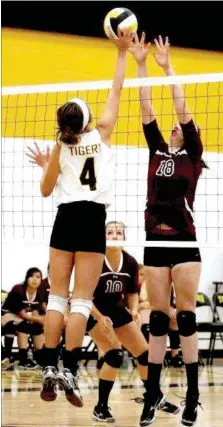  ?? FILE PHOTO ?? Prairie Grove’s Marie Gregson battles at the net against the Lincoln front line.