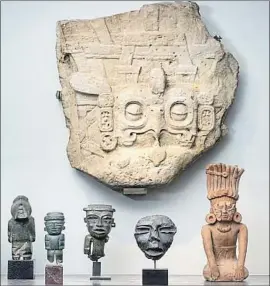  ?? Millon ?? AMONG THE pieces scheduled to be sold at a Paris auction next week is a large, carved relief depicting a Maya king’s headdress that’s believed to be a looted work.
