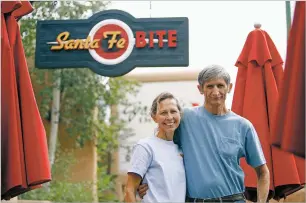  ?? LUIS SÁNCHEZ SATURNO/THE NEW MEXICAN ?? Bonnie Eckre and her husband, John Eckre, owners of the Santa Fe Bite, are closing the restaurant next month. ‘Bonnie and I have realized it’s time for us to not be in the restaurant business anymore,’ John Eckre said Wednesday.