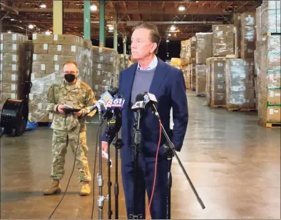  ?? Hearst Connecticu­t Media / Christine DeRosa ?? Gov. Ned Lamont speaks at a press conference in New Britain on Friday after 426,000 tests were delivered overnight.