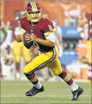  ?? Ron Schwane / Associated Press ?? Washington Redskins quarterbac­k Kirk Cousins will be the top free agent available in mid-March.