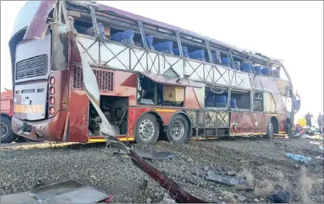  ?? Picture: RIEKS TOWING ?? TRAGIC: Ten people have died and 30 others were injured when this bus, whose driver apparently lost control after hitting an animal, overturned near Beaufort West after 2am yesterday.