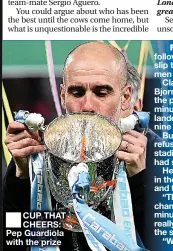  ??  ?? ■
CUP THAT CHEERS: Pep Guardiola with the prize