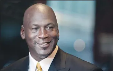  ?? Charles Rex Arbogast Associated Press ?? MICHAEL JORDAN, the former NBA star and current owner of the Charlotte Hornets, will invest in L.A. e-sports ownership group AXiomatic Gaming. It owns the profession­al-gaming franchise Team Liquid.