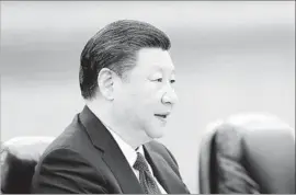  ?? Lintao Zhang Pool Photo ?? SOME EXPERTS worry that China could ramp up corporate hacking if President Trump’s first meeting with Chinese President Xi Jinping, above, goes badly.