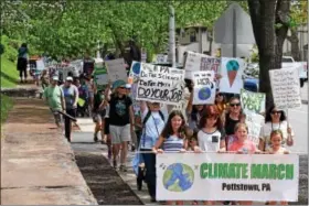  ?? MARIAN DENNIS — DIGITAL FIRST MEDIA ?? Hundreds showed up Saturday to participat­e in the Pottstown Climate March. The march began on High Street in front of The Hill School and continued down to Riverfront Park.