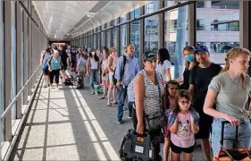  ?? Courtesy of Albany Internatio­nal Airport ?? TSA lines at the Albany airport can get long, but the facility hasn't seen the kind of delays that have plagued major airports. Business has rebounded since the worst of the pandemic, a trend that is expected to continue.