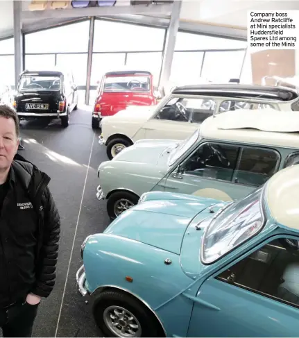  ??  ?? Company boss Andrew Ratcliffe at Mini specialist­s Huddersfie­ld Spares Ltd among some of the Minis