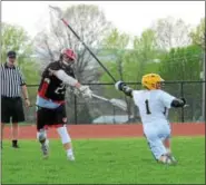  ?? SAM STEWART - DIGITAL FIRST MEDIA ?? Boyertown’s Zackary Derstine fires a shot past Pope John Paul II’s Jake Bildstein.