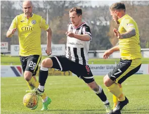  ??  ?? Through the gap: Chris McLeish breaks through for Elgin City