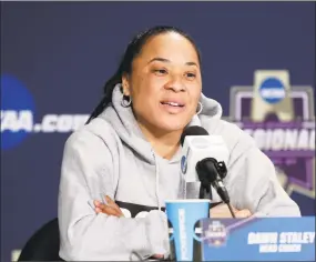  ?? Frank Franklin II / Associated Press ?? South Carolina coach Dawn Staley: “I do think any time you’re in this profession as an African-American woman, man, you have to be successful out of the gate.”