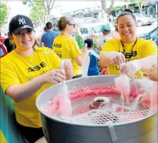  ??  ?? Come and get some free candyfloss.