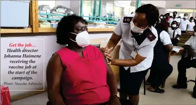  ?? Photo: Nuusita Ashipala ?? Get the jab… Health director Johanna Haimene receiving the vaccine jab at the start of the campaign.
