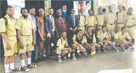  ??  ?? Cross section of Igbobi College students, teachers and staff of Sovereign Trust Insurance Plc, at the 2021 quarterly career talk on insurance, as part of the CSR initiative­s of the underwriti­ng firm, in Lagos, recently