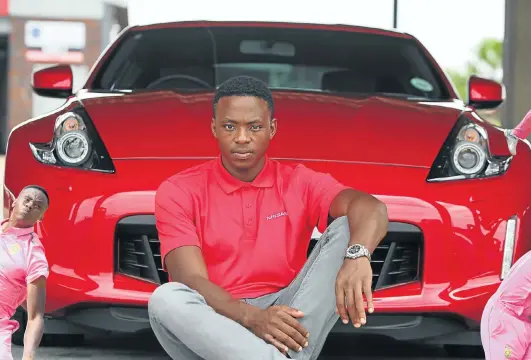  ?? Picture: Alaister Russell ?? Speed bowler Kagiso Rabada poses with his new car at the Zwartkops Raceway in Centurion.