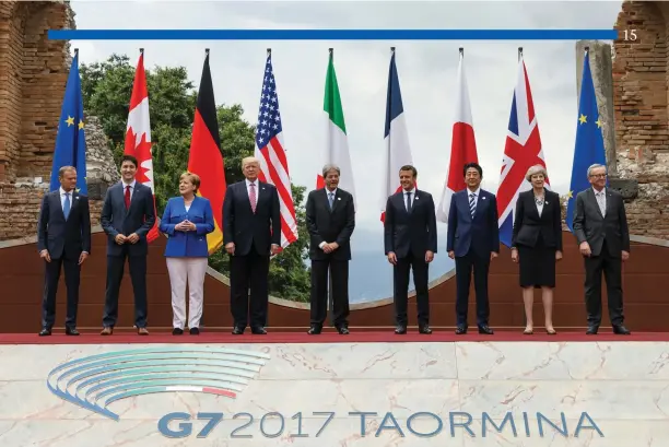  ?? Adam Scotti photo ?? Donald Trump and Justin Trudeau with G7 and EU representa­tives at the G7 Summit in Italy, May 2017. A very different political landscape.