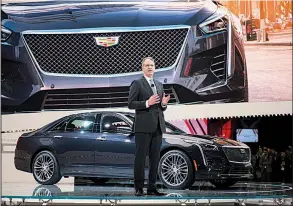  ?? Bloomberg/MARK KAUZLARICH ?? Johan de Nysschen, president of the General Motors Co. Cadillac unit, promotes the Cadillac CT6 V-Sport vehicle in March at the New York Internatio­nal Auto Show. The average sale price of a GM vehicle in the U.S. is $36,000.