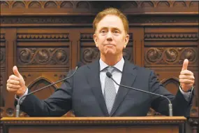  ?? Jessica Hill / Associated Press ?? Gov. Ned Lamont delivers the State of the State during the opening session of the legislatur­e at the state Capitol on Wednesday in Hartford.