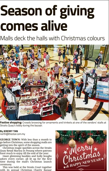  ??  ?? Festive shopping: Crowds browsing for ornaments and trinkets at one of the vendors’ stalls at Straits Quay’s lobby during the bazaar.