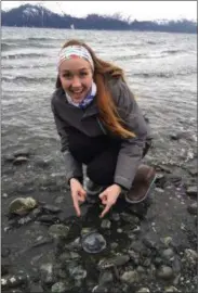  ?? SUBMITTED PHOTO ?? Emilee Niejadlik, a 2019gradua­te of SUNY Morrisvill­e, celebrates graduation day on Saturday, May 11, from Alaska, where she’s an intern with the Alaska SeaLife Center.