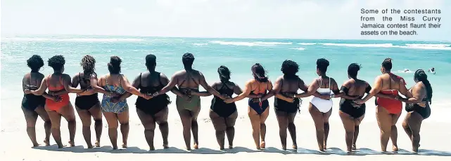  ??  ?? Some of the contestant­s from the Miss Curvy Jamaica contest flaunt their assets on the beach.
