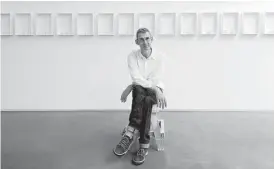  ?? Ben McKee ?? The author and artist Edmund de Waal is pictured in front of one of his ceramic installati­ons. His new book, “The White Road,” was released this week.
