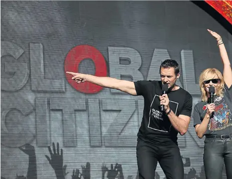  ?? /Reuters ?? Stars against poverty: Hugh Jackman and Chelsea Handler act as hosts during the Global Citizen Festival at Central Park in Manhattan, New York, on September 24 2016.