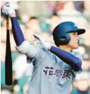  ?? AP FILE ?? Shohei Ohtani hits a home run during a national high school baseball tournament on March 12, 2012, in Nishinomiy­a, western Japan.