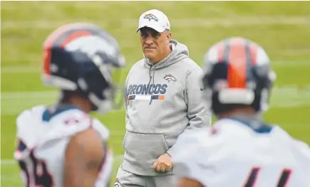  ?? Hyoung Chang, The Denver Post ?? Expect Broncos coach Vic Fangio to have to deal with a quarterbac­k controvers­y, and how he deals with that will be critical to his success as a head coach.