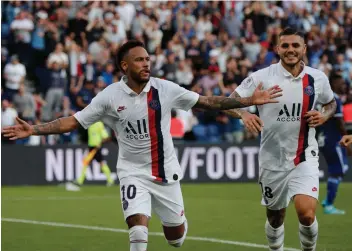  ?? — AP ?? Neymar (left) celebrates his goal with Paris Saint-Germain team-mate Mauro Icardi during the French League One soccer match against Strasbourg in Paris on Saturday.