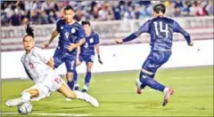  ?? AFP ?? Keo Sokpheng (right) scores for Cambodia during the match against the Philippine­s at the Southeast Asian Games in Manila on Monday.