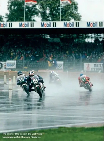  ??  ?? The quarter-litre class in the wet was a treacherou­s affair. Spencer, Ricci etc...