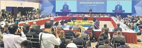  ??  ?? Vietnam’s Prime Minister Nguyen Xuan Phuc delivers a speech at the Asia-Pacifics Economic Cooperatio­n (Apec) 23rd Ministers responsibl­e for Trade Meeting at the National Convention Centre in Hanoi. — AFP photo