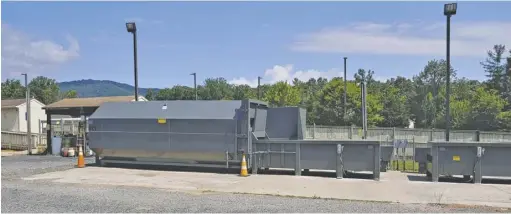  ?? BY PATTY HARDEE ?? “A shi in how we do things,” describes county Administra­tor Garrey Curry, referring to four new trash compactors at the county refuse centers, this one is Amissville.