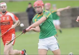  ??  ?? Andrew Smith, Knockbridg­e attempts to block a shot by John Fitzpatric­k, Dunn