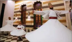  ?? AFP ?? In Syria, members of the Kharrat family are one of the largest Damascene families trying to preserve the Sufi whirling ritual.