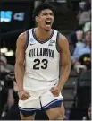  ?? DAVID J. PHILLIP — THE ASSOCIATED PRESS ?? Villanova forward Jermaine Samuels celebrates after scoring against Michigan in the Sweet 16 round of the NCAA Tournament.