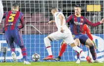  ??  ?? ON THE RUN Mbappe powers past Barca’s defence to equalise