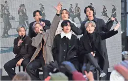  ?? DIA DIPASUPIL/GETTY IMAGES ?? From left, Jimin, Jungkook, RM, J-Hope, V, Jin, and SUGA of the K-pop boy band BTS visit the “Today” Show at Rockefelle­r Plaza in New York City on Feb. 21.