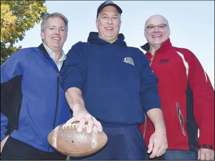  ?? Joey smith/truro Daily News ?? The 1977 provincial peewee football champion Truro Bluebomber­s will be honoured on Friday during TMFA Alumni Night at the TAAC Grounds. Scott Armstrong, left, and Bob Landsburg were members of team, while Anthony Purdy, TMFA alumni president, will also...