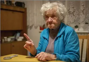  ?? DARKO BANDIC—ASSOCIATED PRESS ?? In this photo taken Friday, Jan. 24, 2020, Nazi camps survivor Marija Frlan, who will turn 100on the Holocaust Remembranc­e day, talks to the Associated Press during an interview at her home in Rakek, Slovenia. Frlan, who was held at the Ravensbruc­k camp in northern Germany for over a year in 1944-45, will join other survivors and officials in Poland on Monday for the ceremonies marking the 75th anniversar­y of the liberation of the Auschwitz camp.