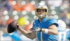  ?? JOSE SANCHEZ/THE ASSOCIATED PRESS] [MARCIO ?? Los Angeles Chargers quarterbac­k Philip Rivers did not direct a touchdown drive last week for only ninth time in 224 starts.