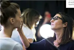  ??  ?? Celebrated make-up artist Bobbi Brown at work during New York Fashion Week