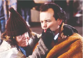  ?? PARAMOUNT PICTURES ?? Anne Ramsey and Bill Murray starred in 1998’s Scrooged, yet another adaptation.