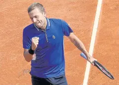 ?? AFP ?? Daniel Evans celebrates after beating Novak Djokovic in Monte Carlo.