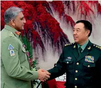  ?? APP ?? Chief of the Army Staff General Qamar Javed Bajwa meets with General Fan Changlong, Vice Chairman Central Military Commission, in Beijing during a three-day official visit to China. —