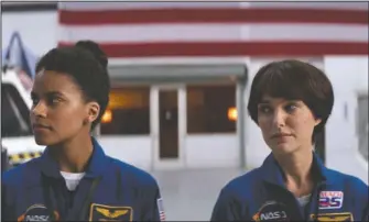  ?? The Associated Press ?? STRANGER-THAN-FICTION STORY: Zazie Beetz, left, and Natalie Portman in a scene from "Lucy In The Sky."