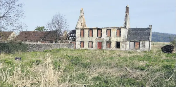  ??  ?? In ruins Council-owned, B-listed, early 18th century Borrowmead­ow Farm near Stirling sports village. In‘high risk’category of Historic Environmen­t Scotland’s‘buildings At Risk’ register.