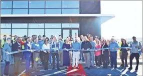  ?? Gordon County Chamber of Commerce ?? Kenco cuts the ribbon on its 315 Clarence King Drive distributi­on center to service Kerry Group’s Calhoun and Rome locations across the Southeast.