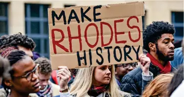  ?? ?? Sign of the times: Oxford students protesting over statue of Cecil Rhodes at Oriel College